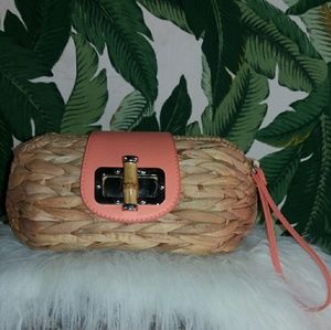 Straw and coral accented clutch handbag